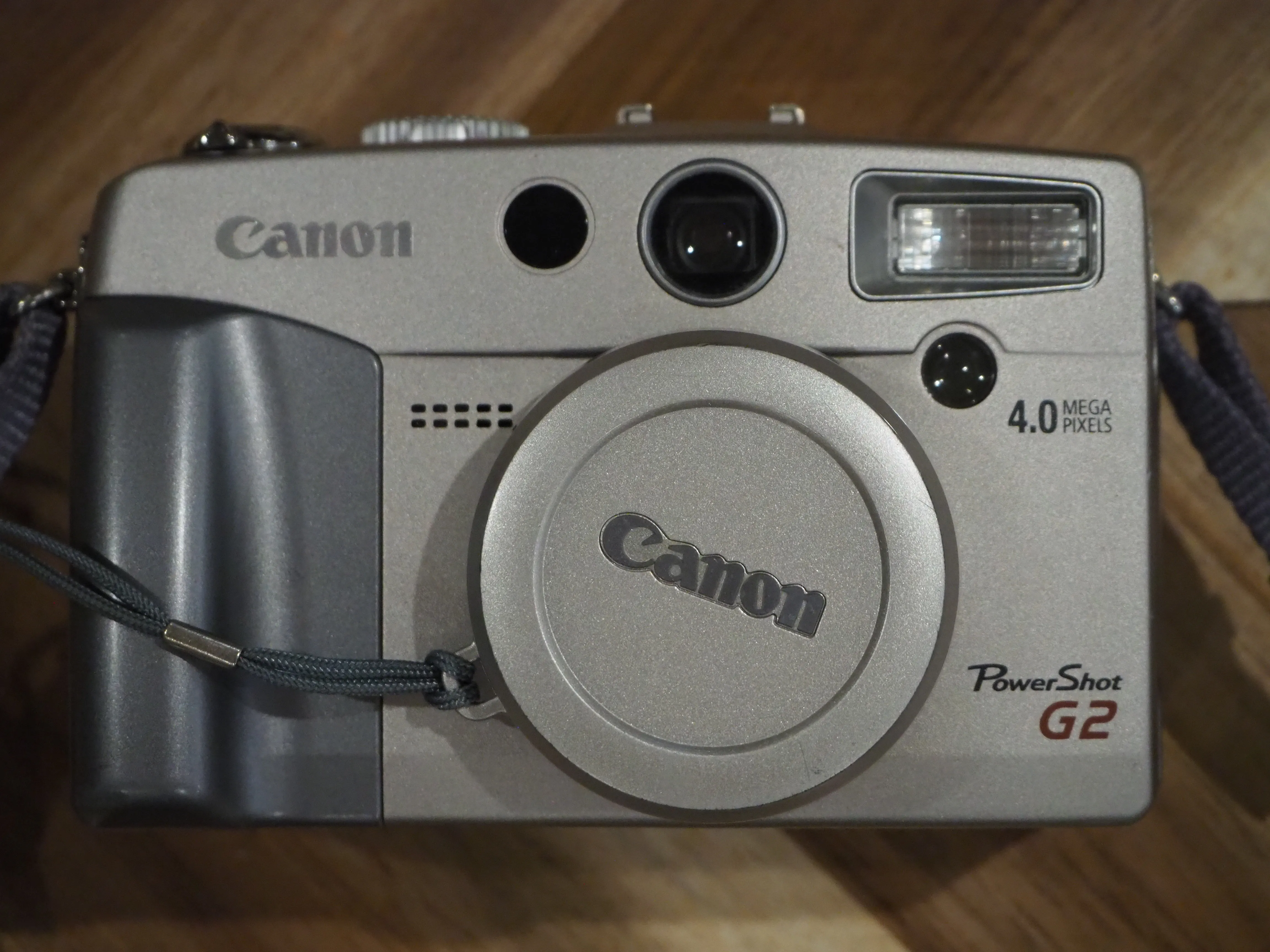 Straight-on front view of the Canon PowerShot G2.